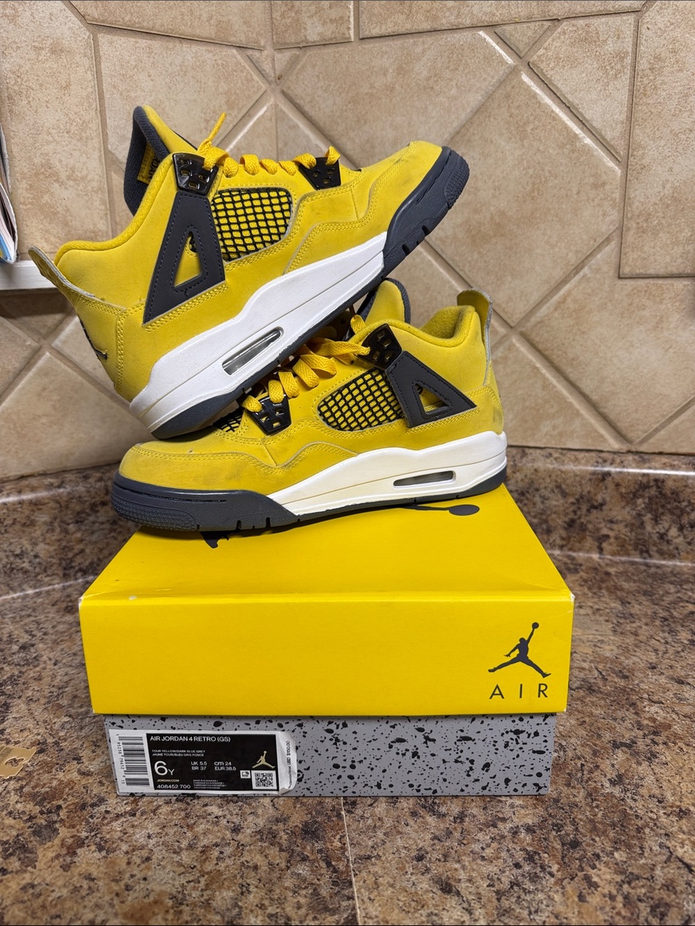 Jordan Kids' Yellow and Black Retro 4 Sneakers